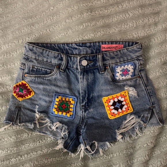 Blank NYC Women's Distressed Denim Shorts with Colorful Crochet Accents - Picture 1 of 4